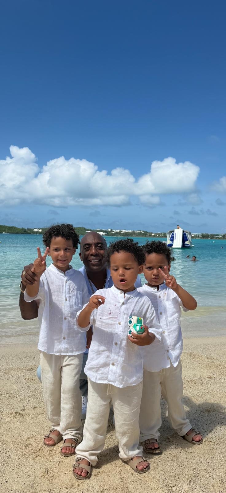 Ricardo with his three sons in Bermuda
